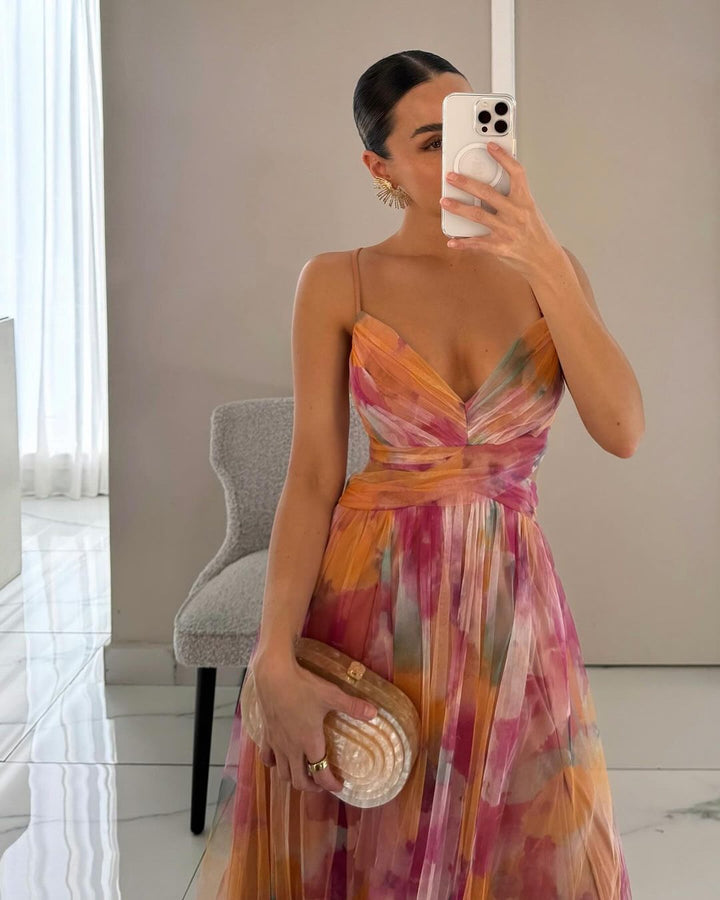 Vera – Abito da designer con motivo floreale
