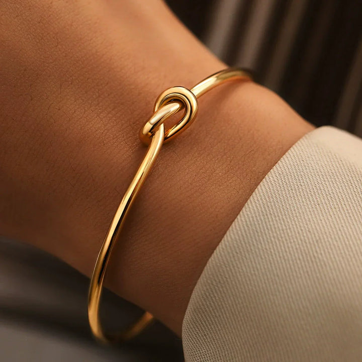 Vallini | Bracciale elegante con nodo aperto.